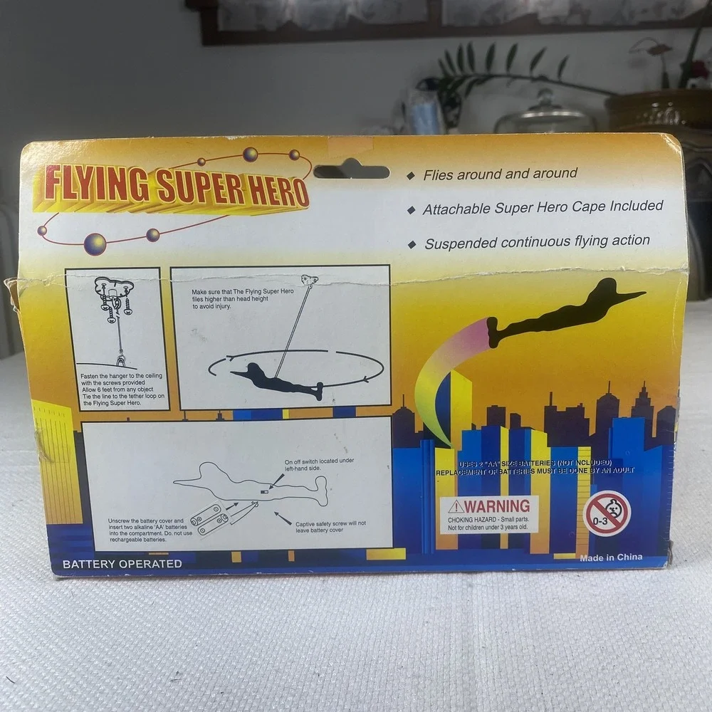 Flying Super Hero Action Figure Toy Battery Operated Cape Included Spins In Air